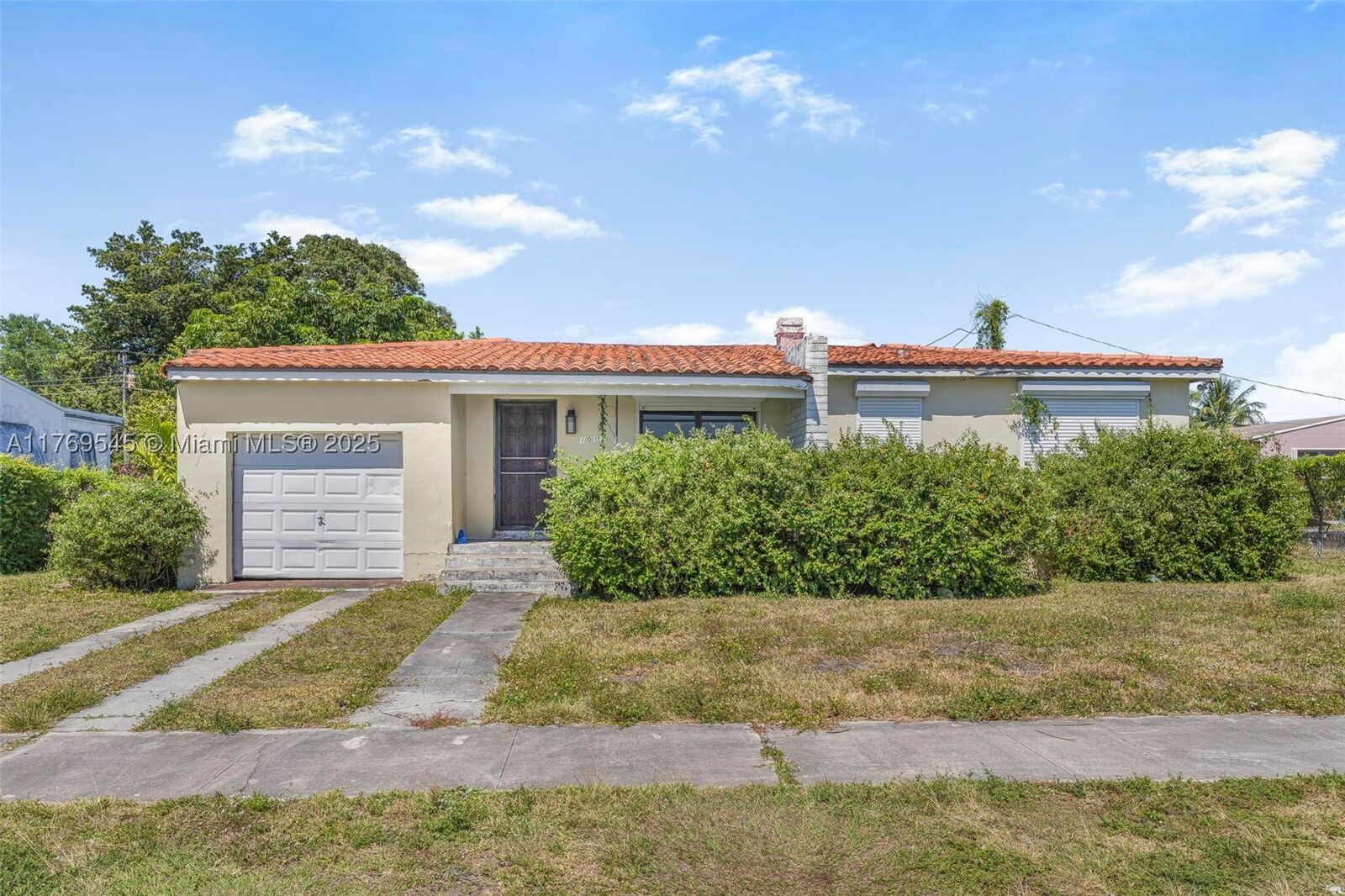 Property Photo: 1011 NW 89th St FL 33150