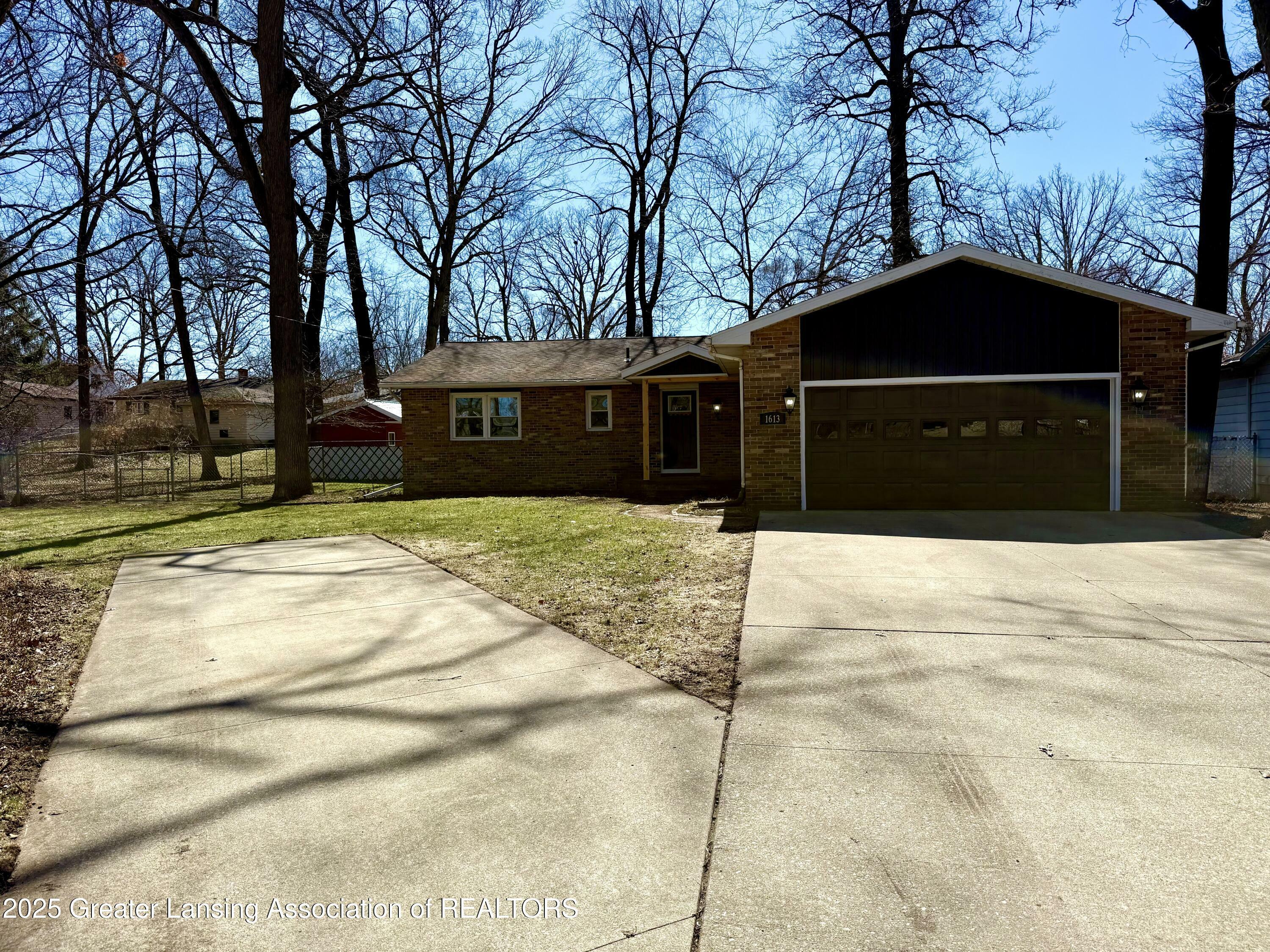 Property Photo: 1613 Shady Oak Lane MI 48906