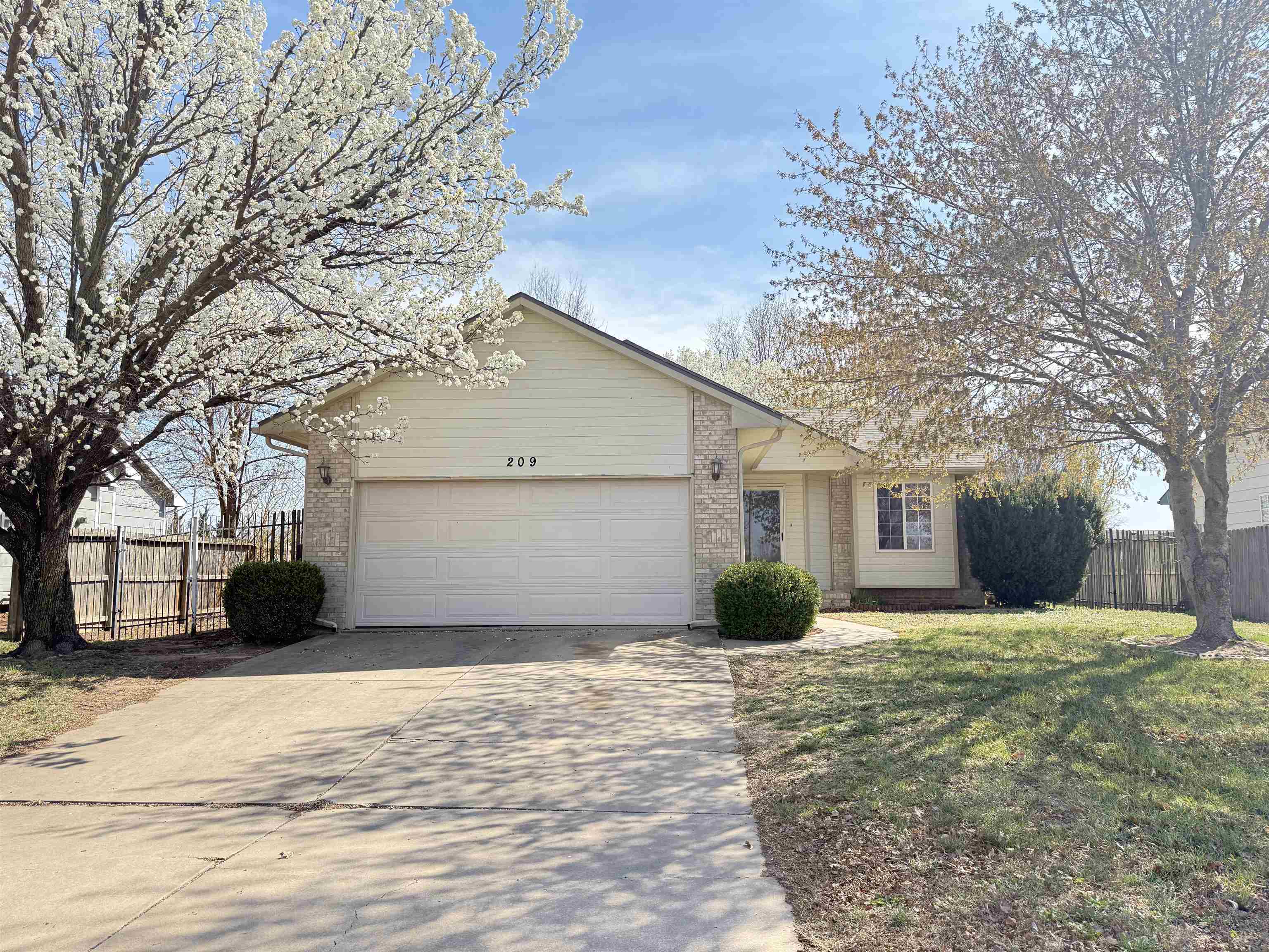 Property Photo: 209 W Tall Tree Rd KS 67037-8612
