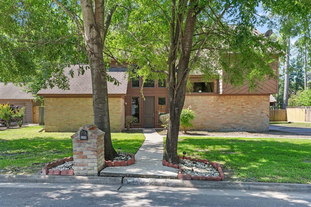 Property Photo: 309 S Rivershire Drive TX 77304