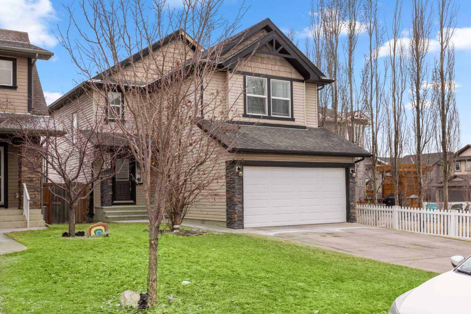 Property Photo:  322 Coopers Drive SW  AB T4B 0L8 