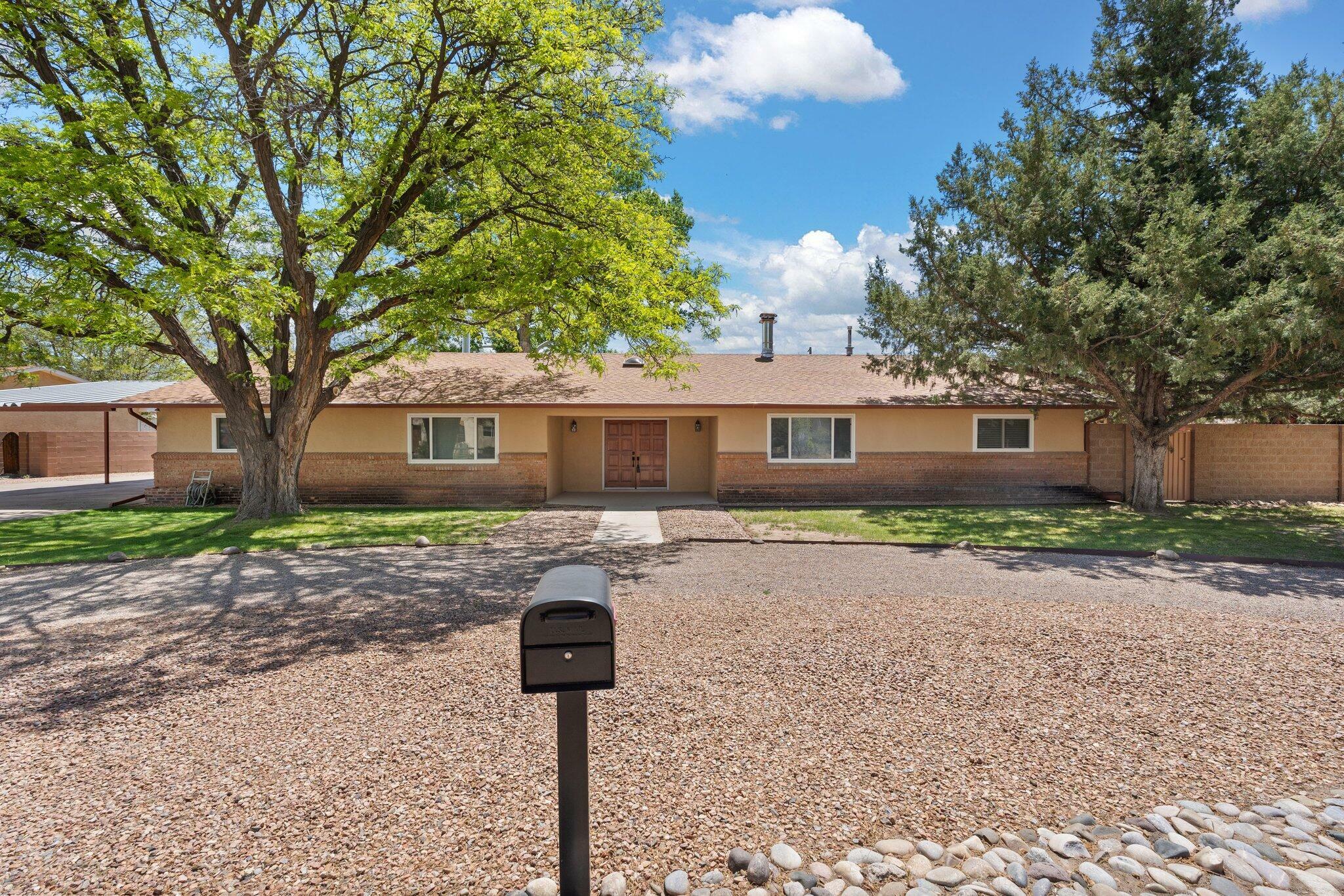 Property Photo: 9816 Riverside Road NW NM 87114