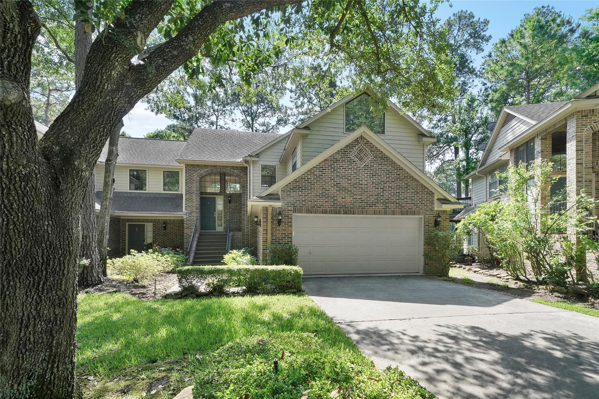 Property Photo: 4 Fairway Oaks Place 4 TX 77380