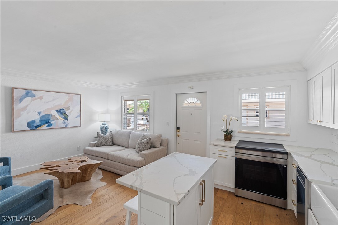 Property Photo:  980 7th Avenue S 107  FL 34102 