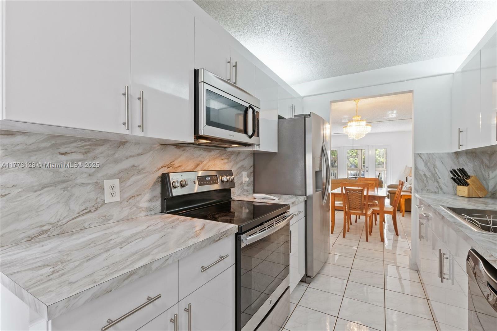 Property Photo: 1251 SW 125th Ave 211T FL 33027