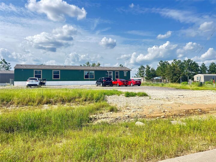 Property Photo:  348 Road 5604  TX 77327 