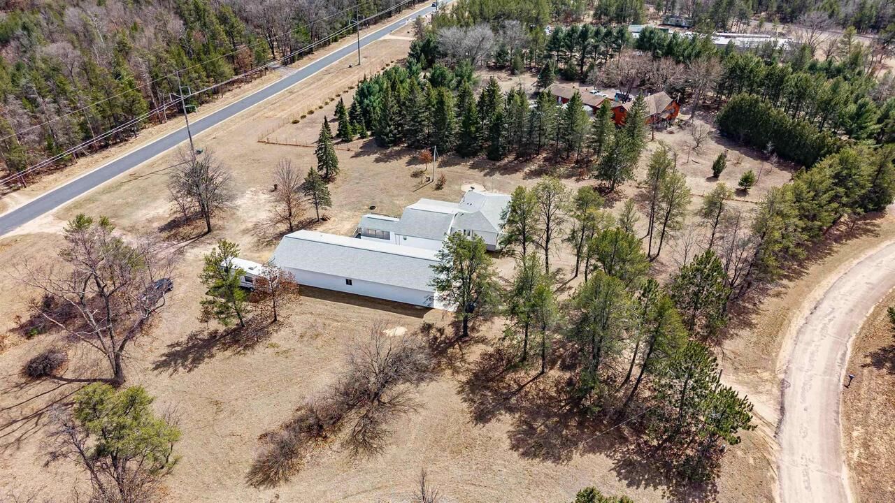 Property Photo:  N10368 Queens Way  WI 54646 