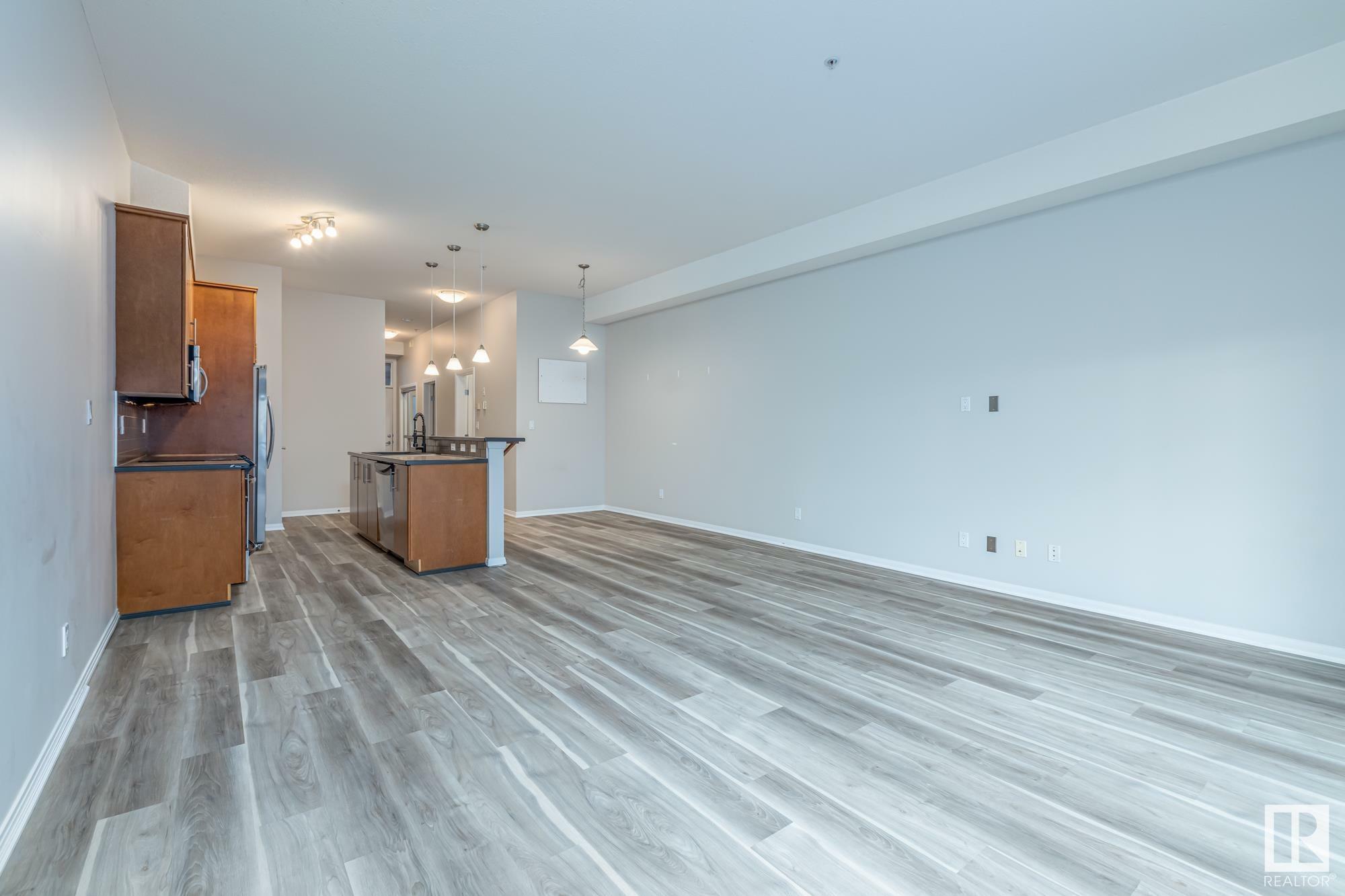 Property Photo: 10531 117 Street NW 220 AB T5H 3L7