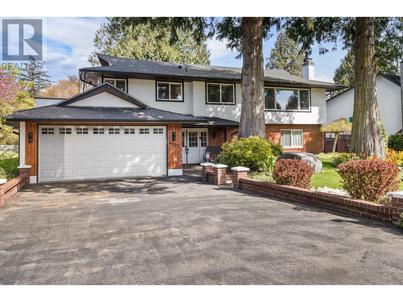 Property Photo: 4907 7A Avenue BC V4M 1R3