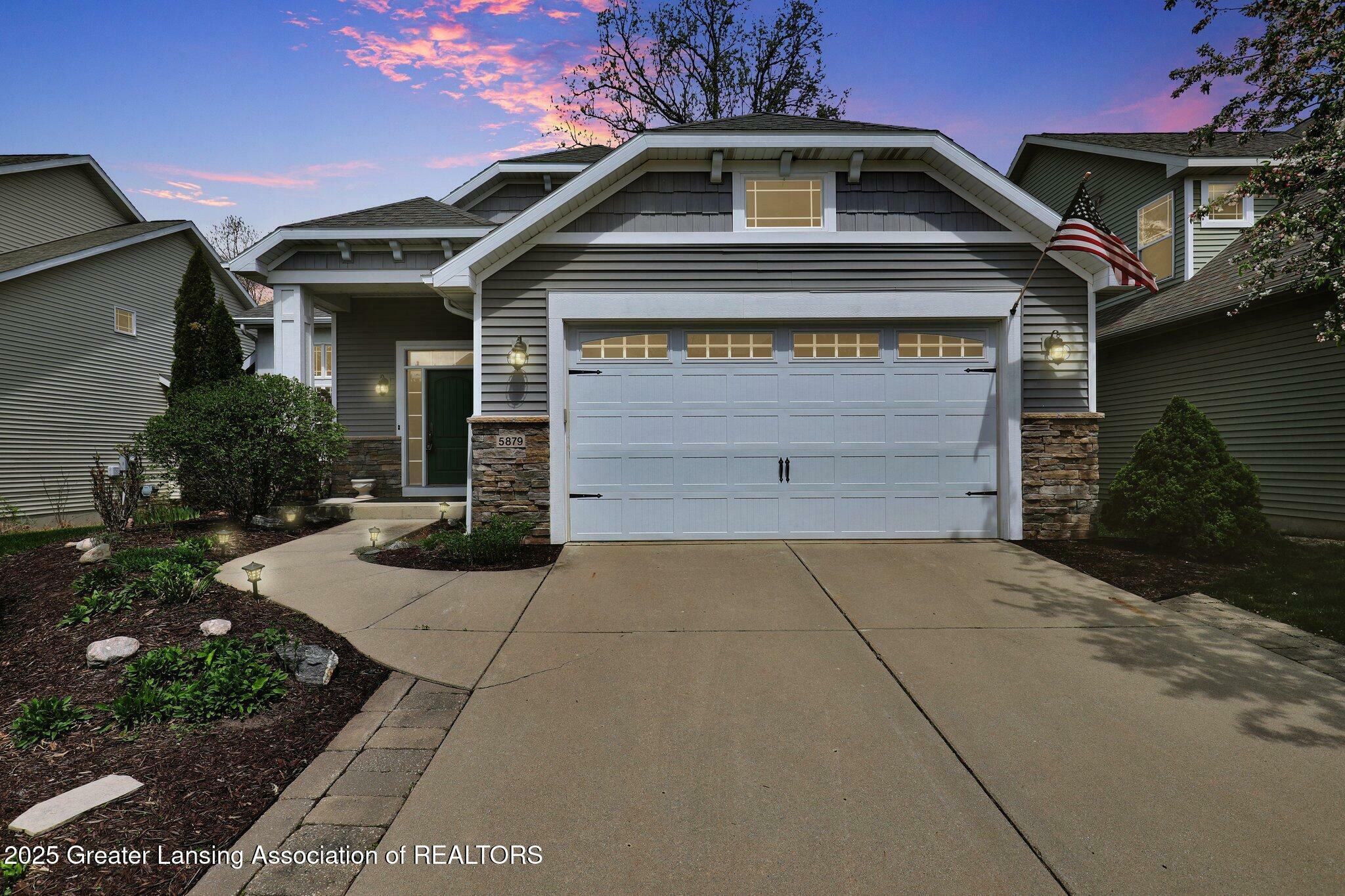Property Photo: 5879 Chartres Way MI 48823