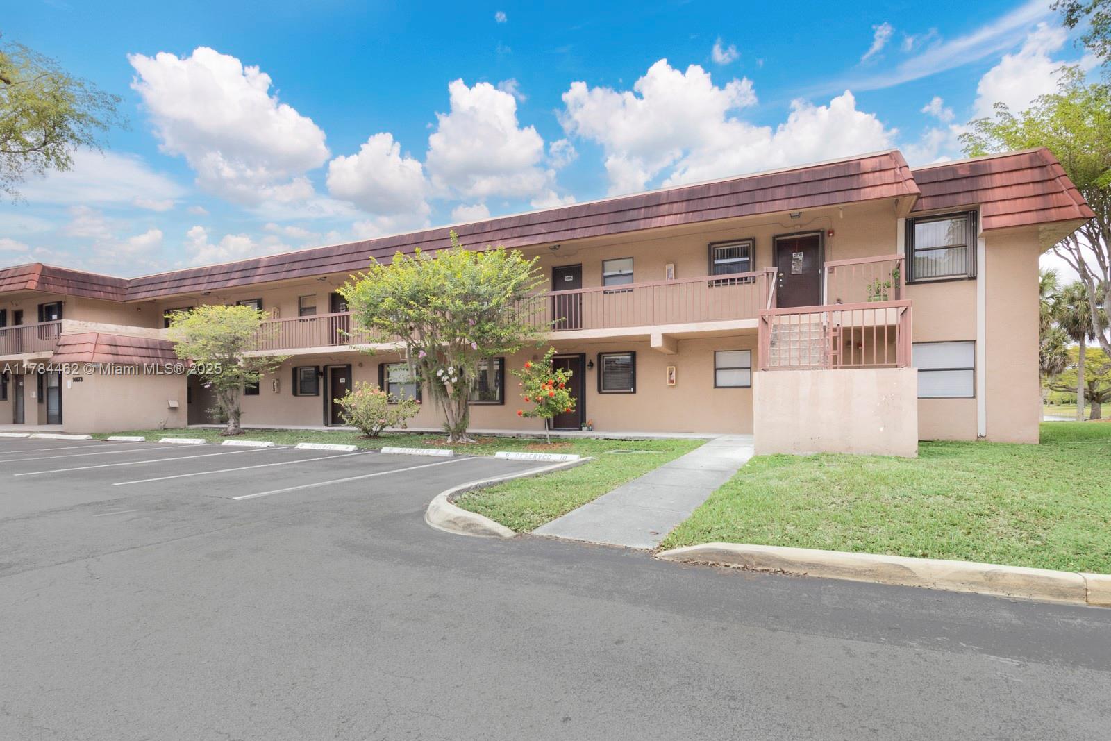 Property Photo:  14873 SW 104th St 6-105  FL 33196 