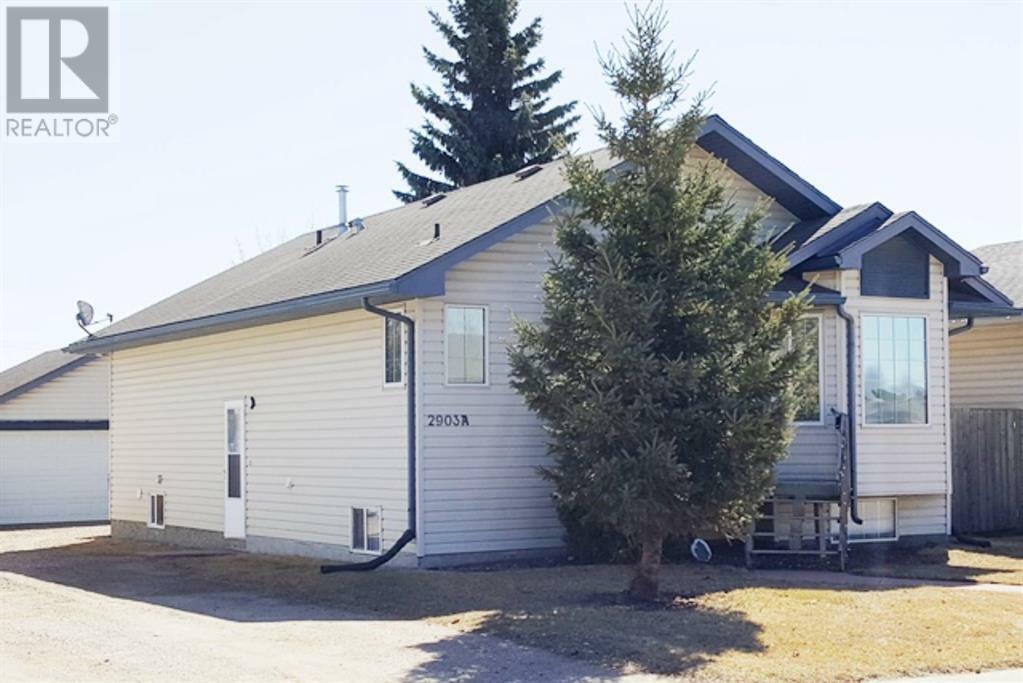 Property Photo: 2903 51 Avenue AB T9V 1H8