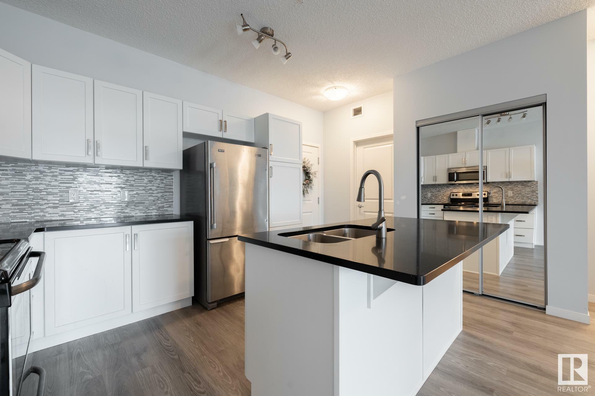 Property Photo: 1820 Rutherford Road SW 418 AB T6W 2K6