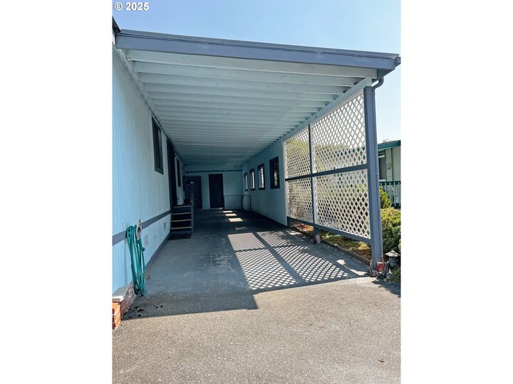 Property Photo:  16063 Driftwood Ln 26  OR 97415 
