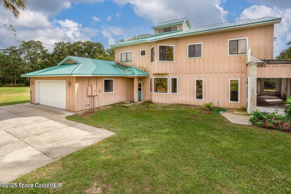 Property Photo: 1437 N Tropical Trail FL 32953