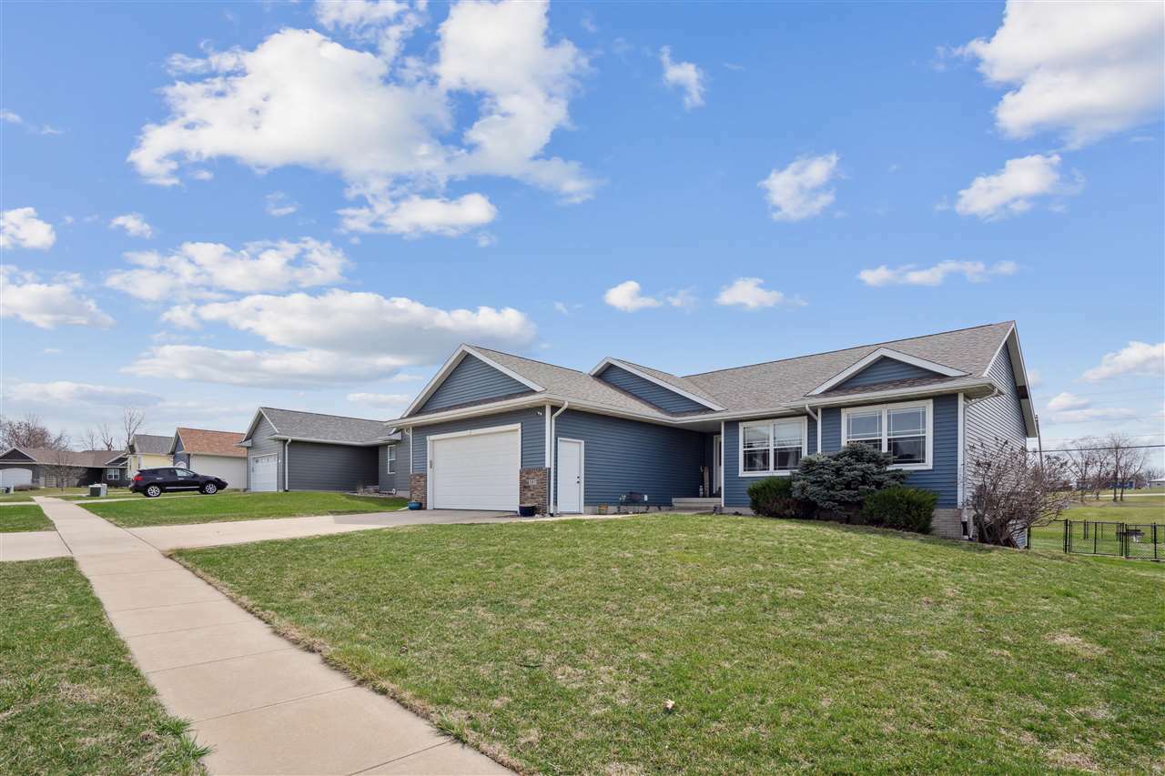 Property Photo: 207 Cherry Park Dr NW IA 52405