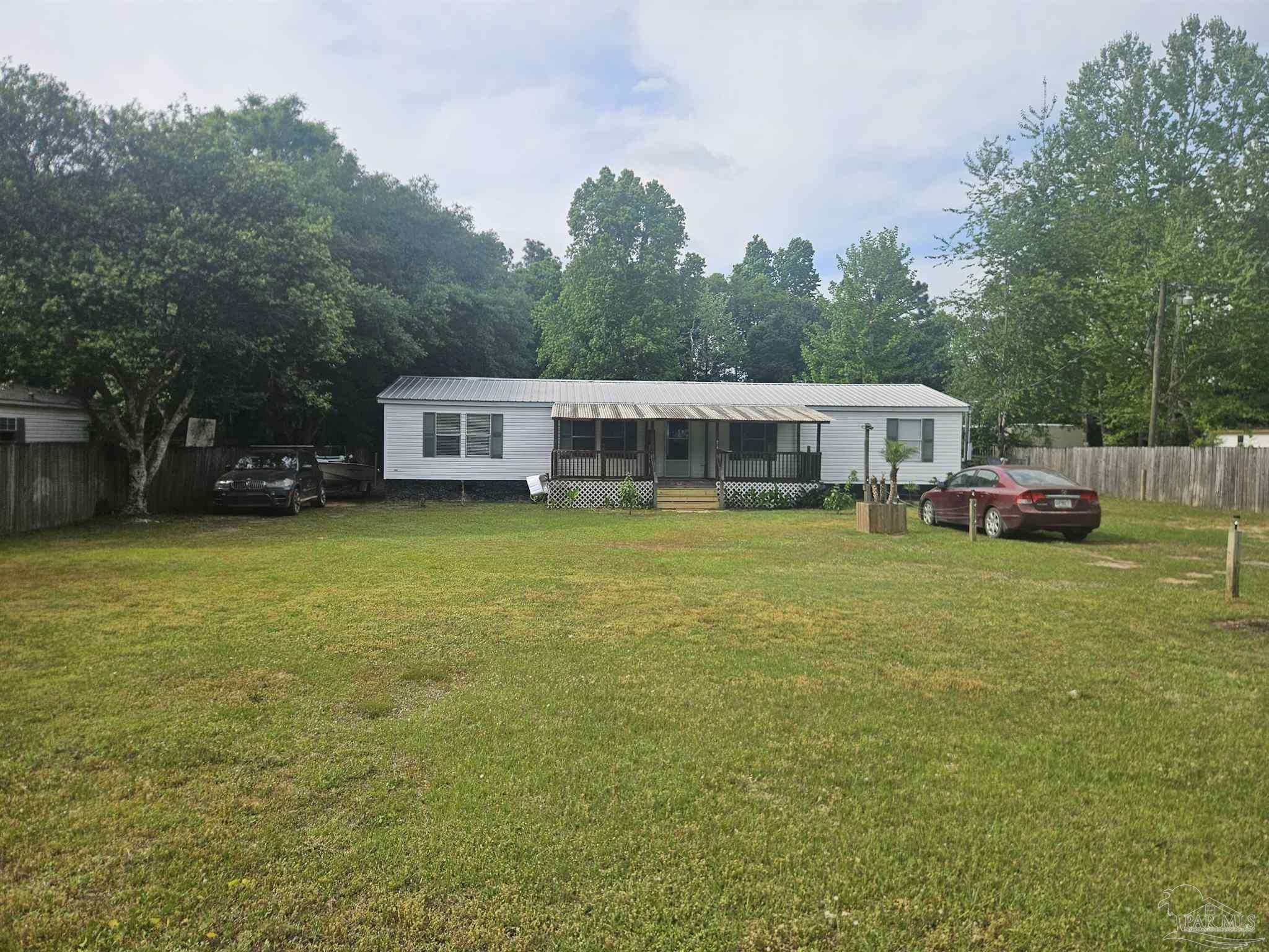 Property Photo: 8250 Punjob Rd FL 32583