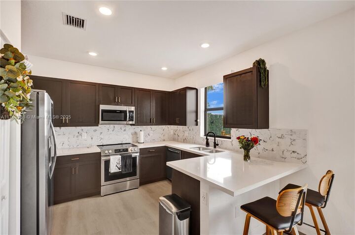 Property Photo: 20540 NE 5th Pl FL 33179