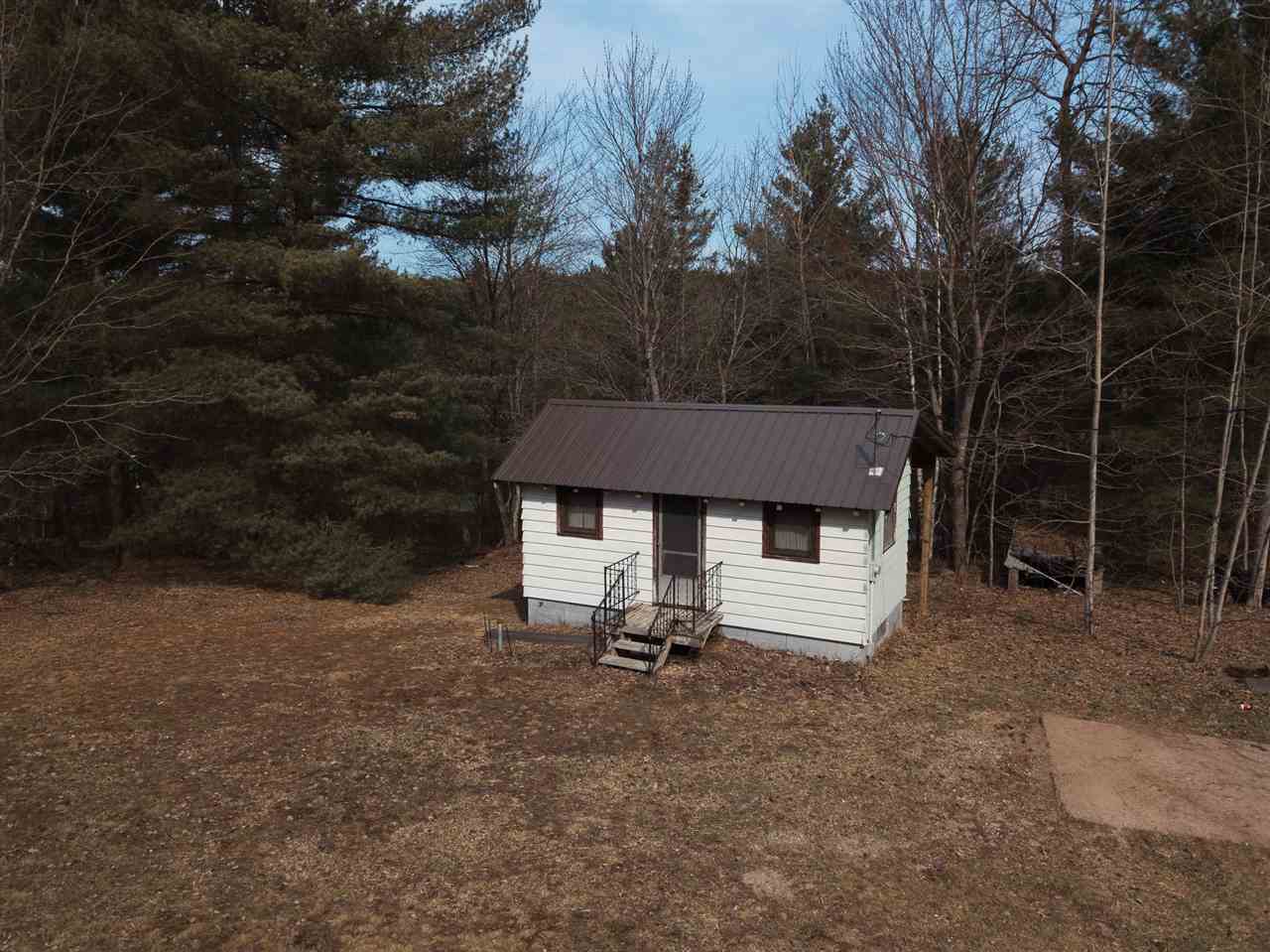 Property Photo:  11457 NE Starvation Lake  MI 49659 