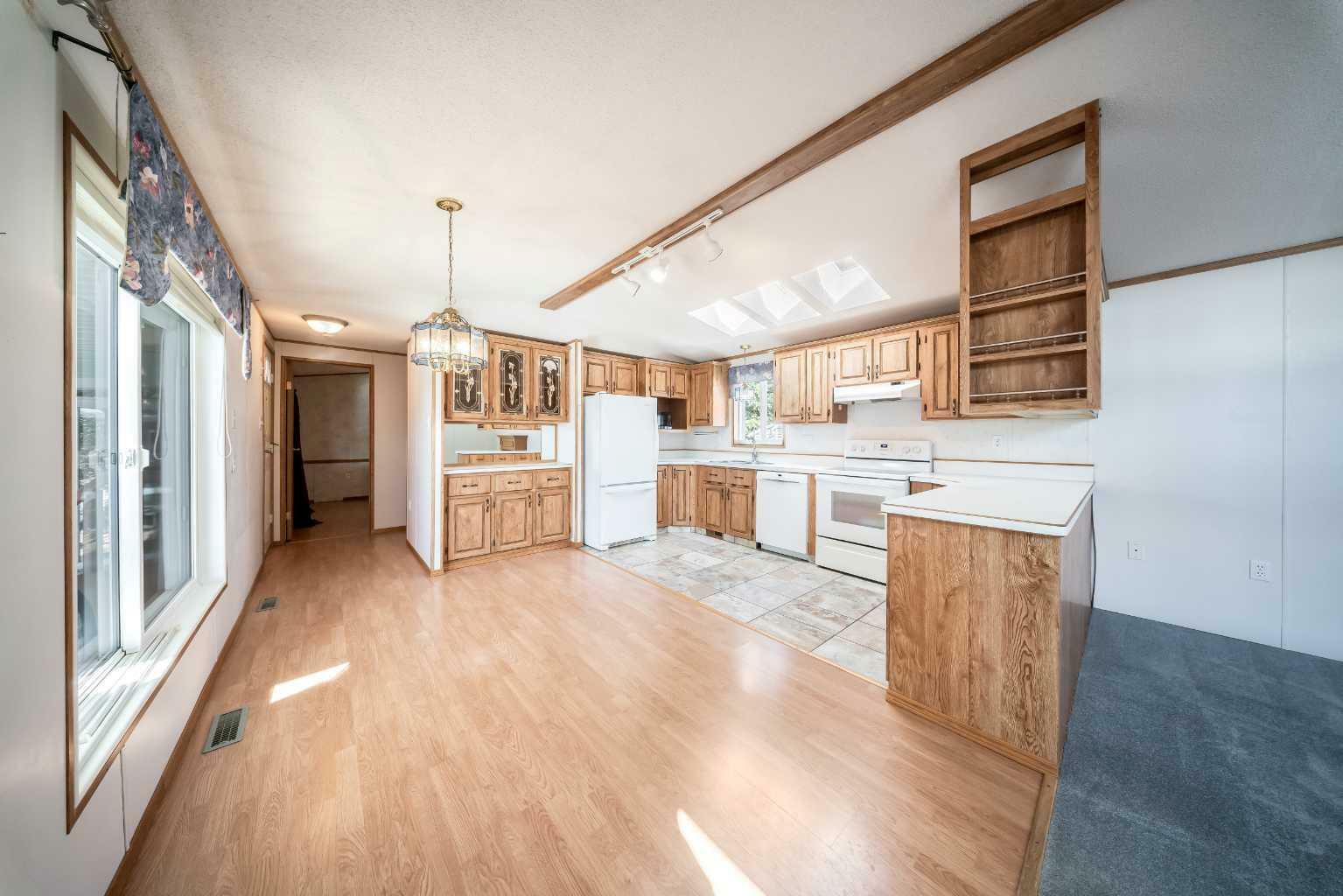 Property Photo: 37543 England Way 505 AB T4S 2C3