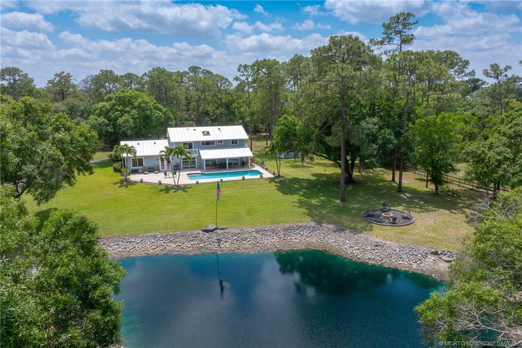 Property Photo: 6955 SW Woodbine Way FL 34990