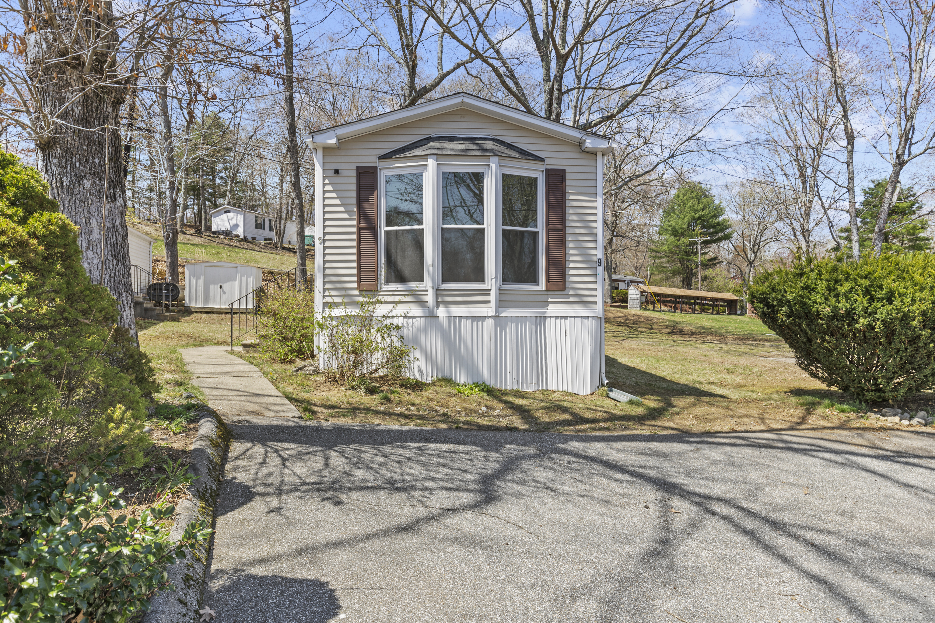 Property Photo: 303 Mohegan Park Road Lot 9 CT 06360