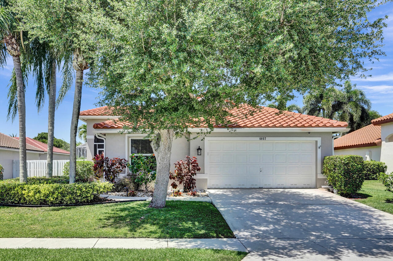 Property Photo: 6057 Kemper Lakes Drive FL 33463