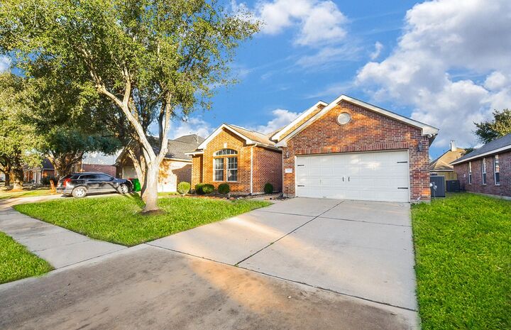 Property Photo: 15027 Wildberry Creek Court TX 77433