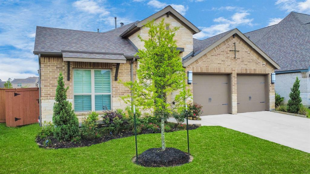 Property Photo: 11910 Bazley Knoll Dr Drive TX 77346