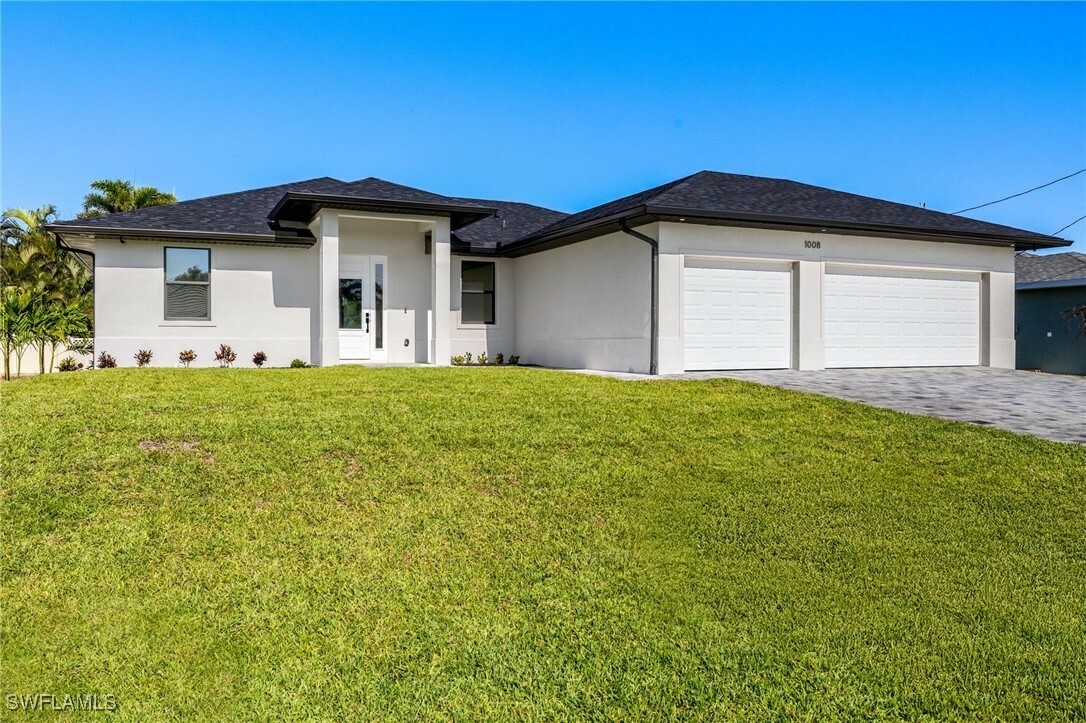 Property Photo: 1008 NW 36th Place FL 33993