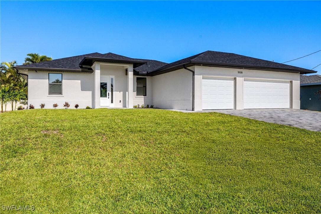 Property Photo: 1008 NW 36th Place FL 33993