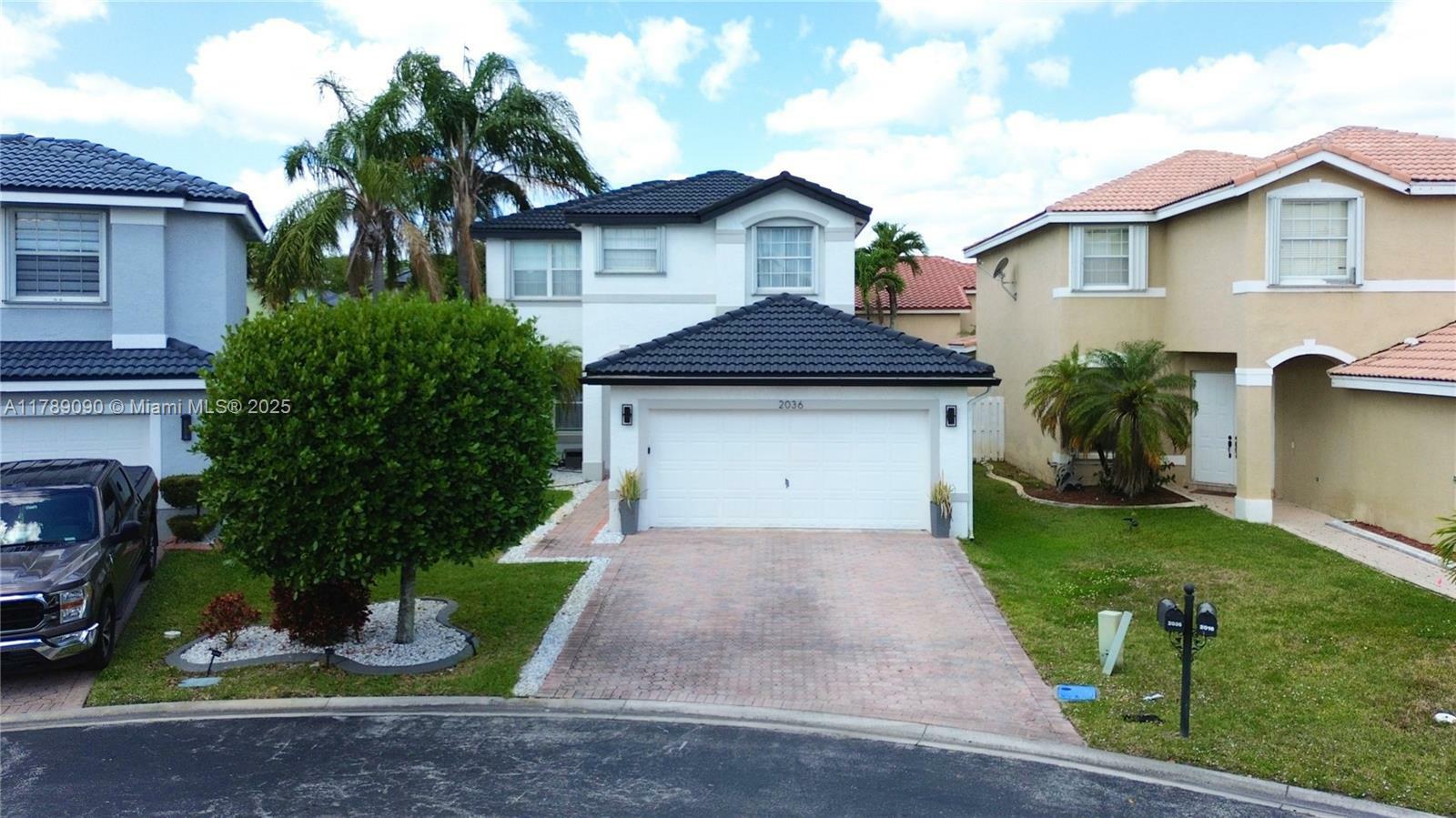 Property Photo: 2036 SW 159th Ave FL 33027
