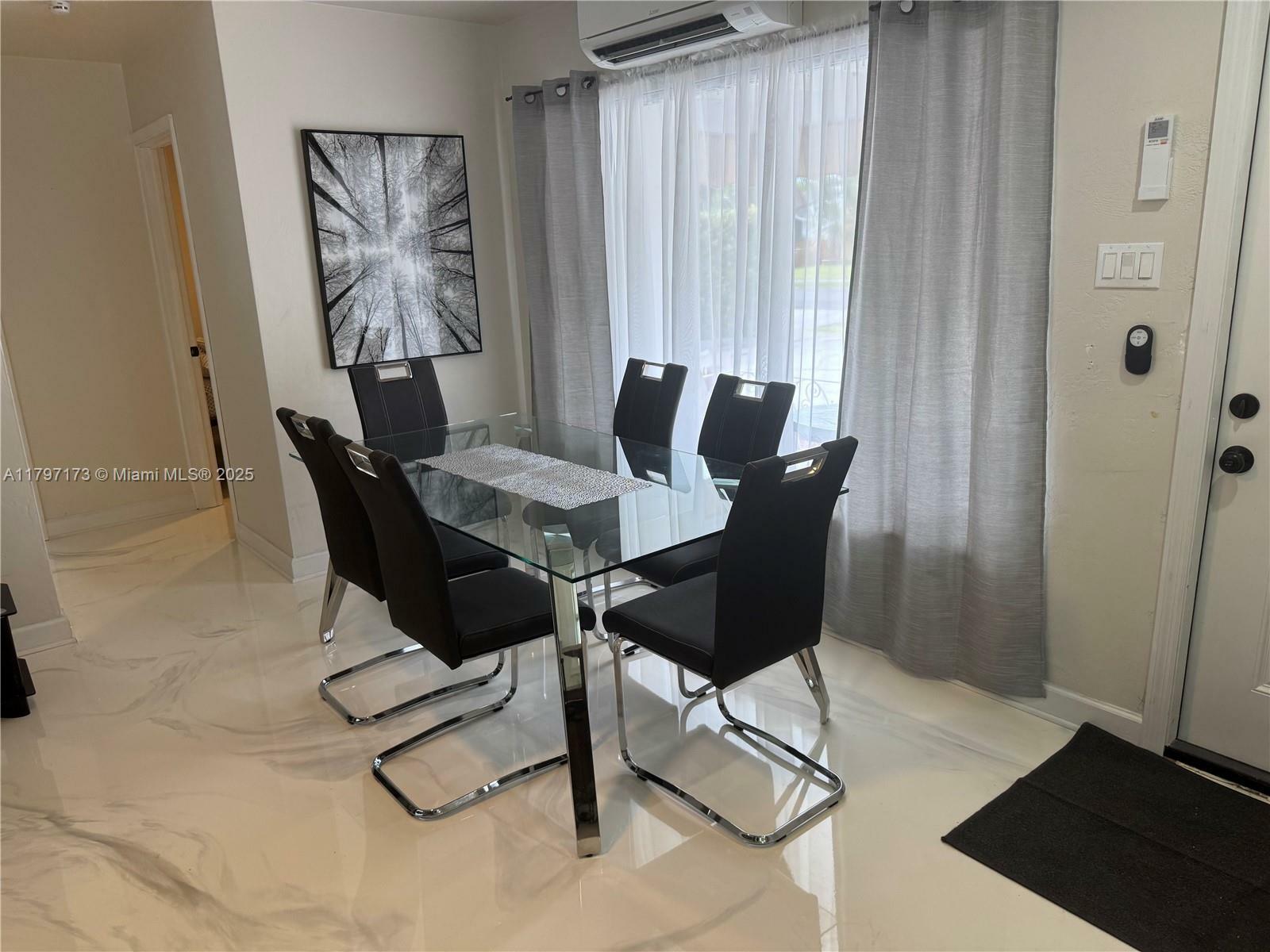 Property Photo: 825 NE 6th St 1 FL 33009