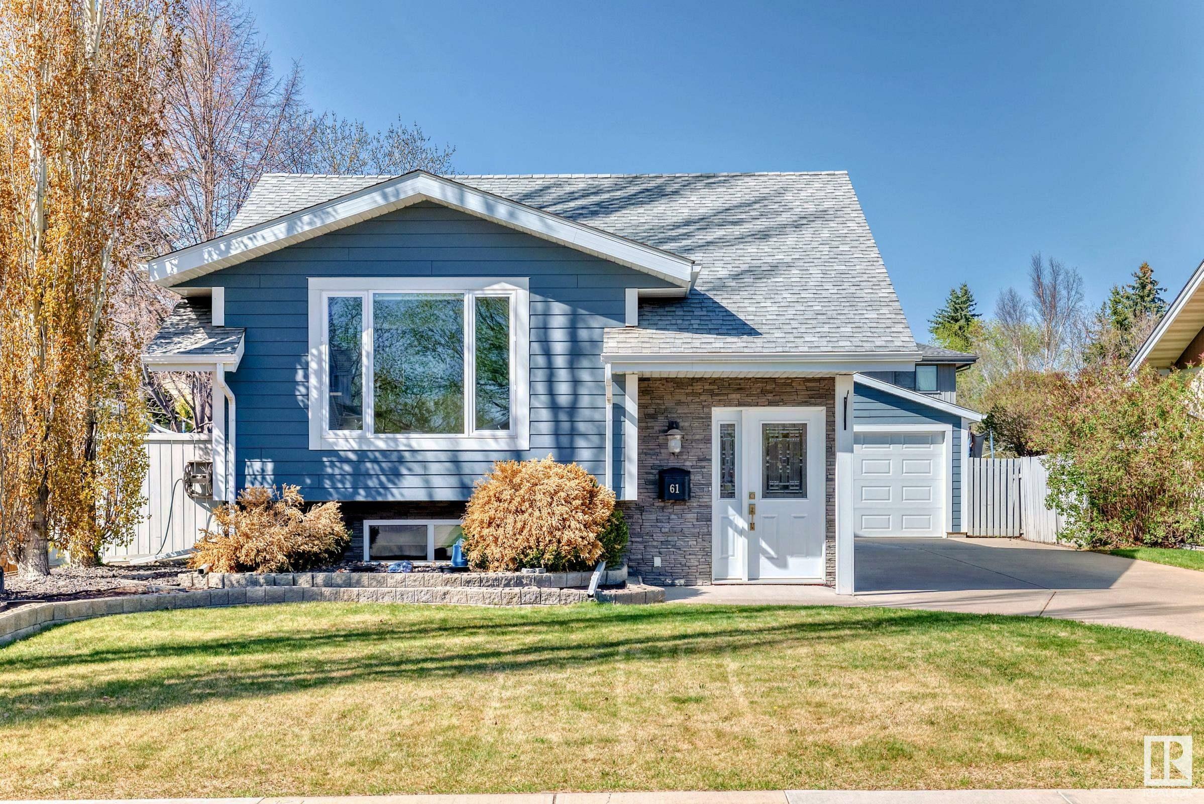 Property Photo: 61 Woodbine Road AB T8A 4A7