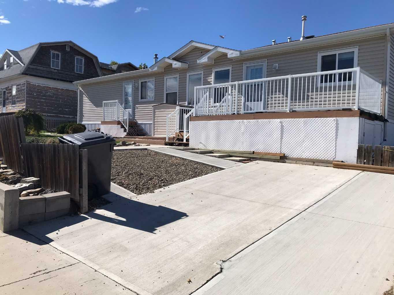Photo de la propriété: 208 2A Street W AB T0K 0N0