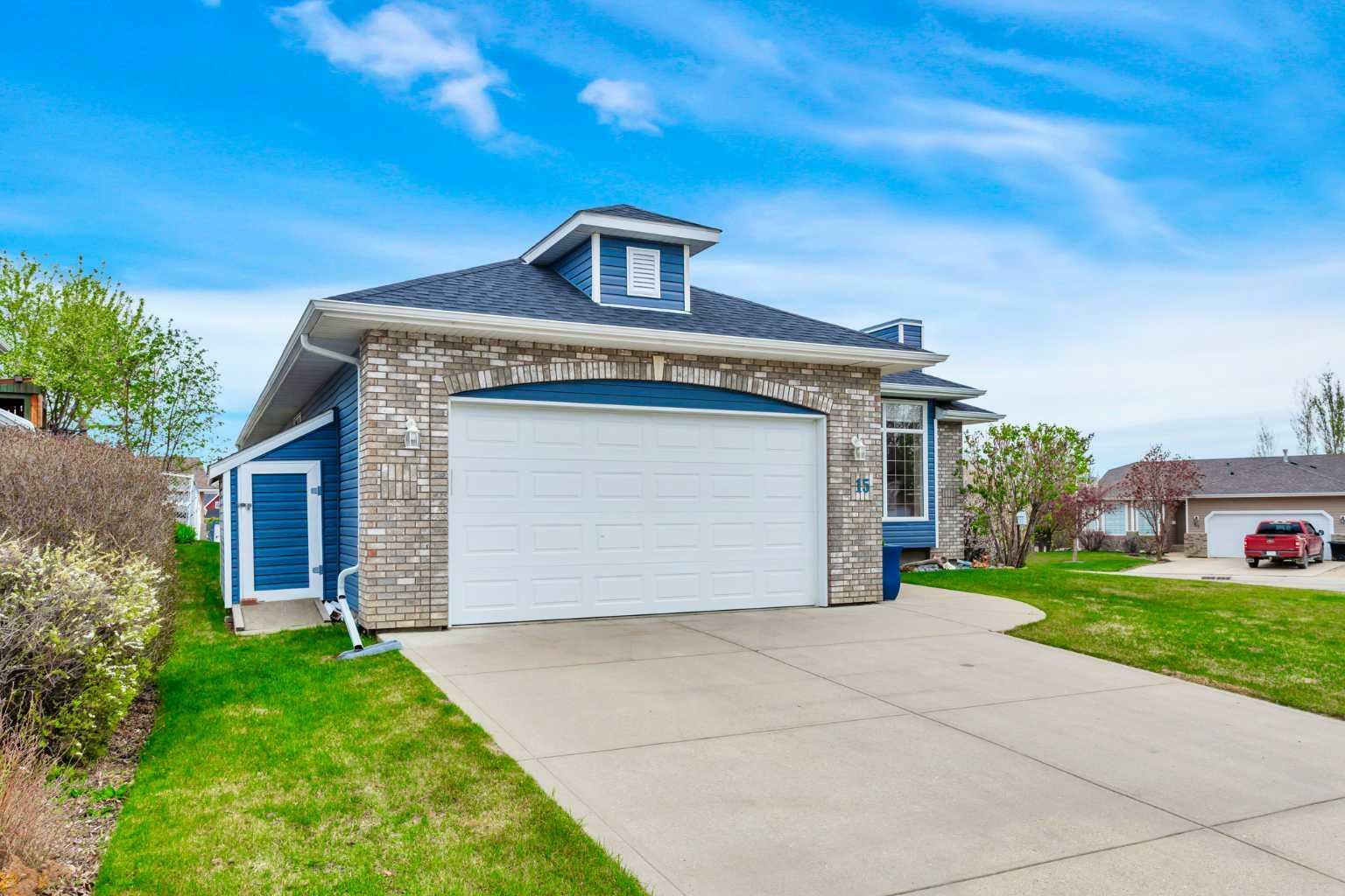 Property Photo: 15 Lakes Close AB T4L 1S5