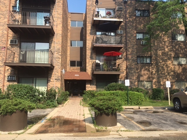 Property Photo: 8894 N Knight Avenue 412 IL 60016