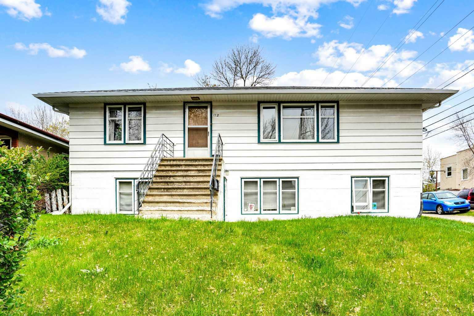 Property Photo: 112 29 Avenue NW AB T2M 2L8