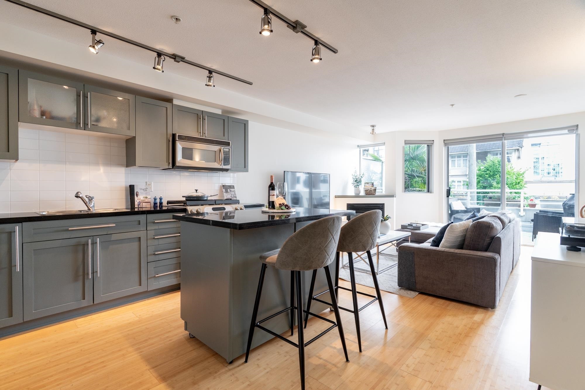 Property Photo: 122 E 3rd Street 203 BC V7L 1E6
