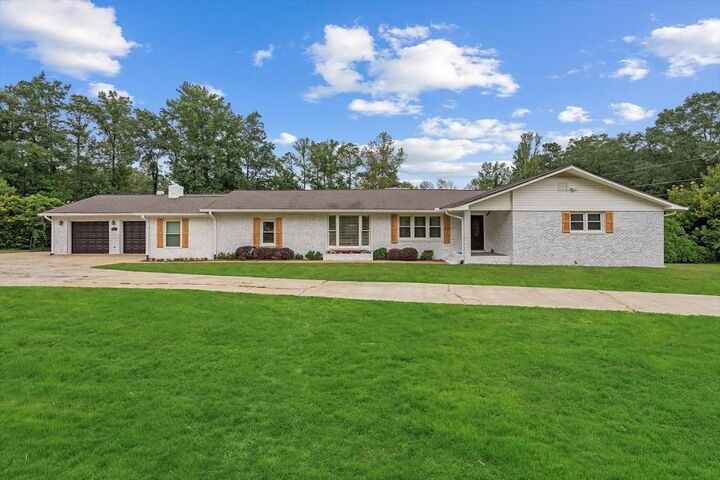 Property Photo:  2716 Georgia 16  GA 30116 