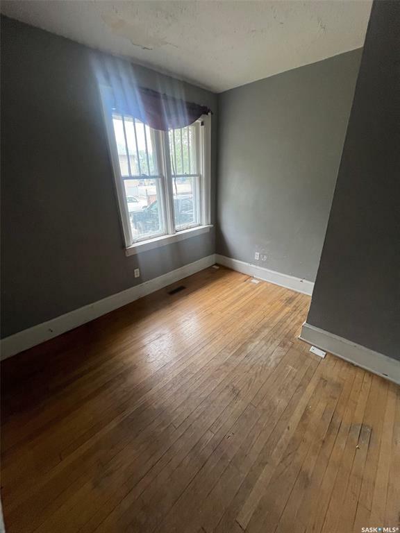 Property Photo: 1234 Victoria Avenue SK S4P 0N9