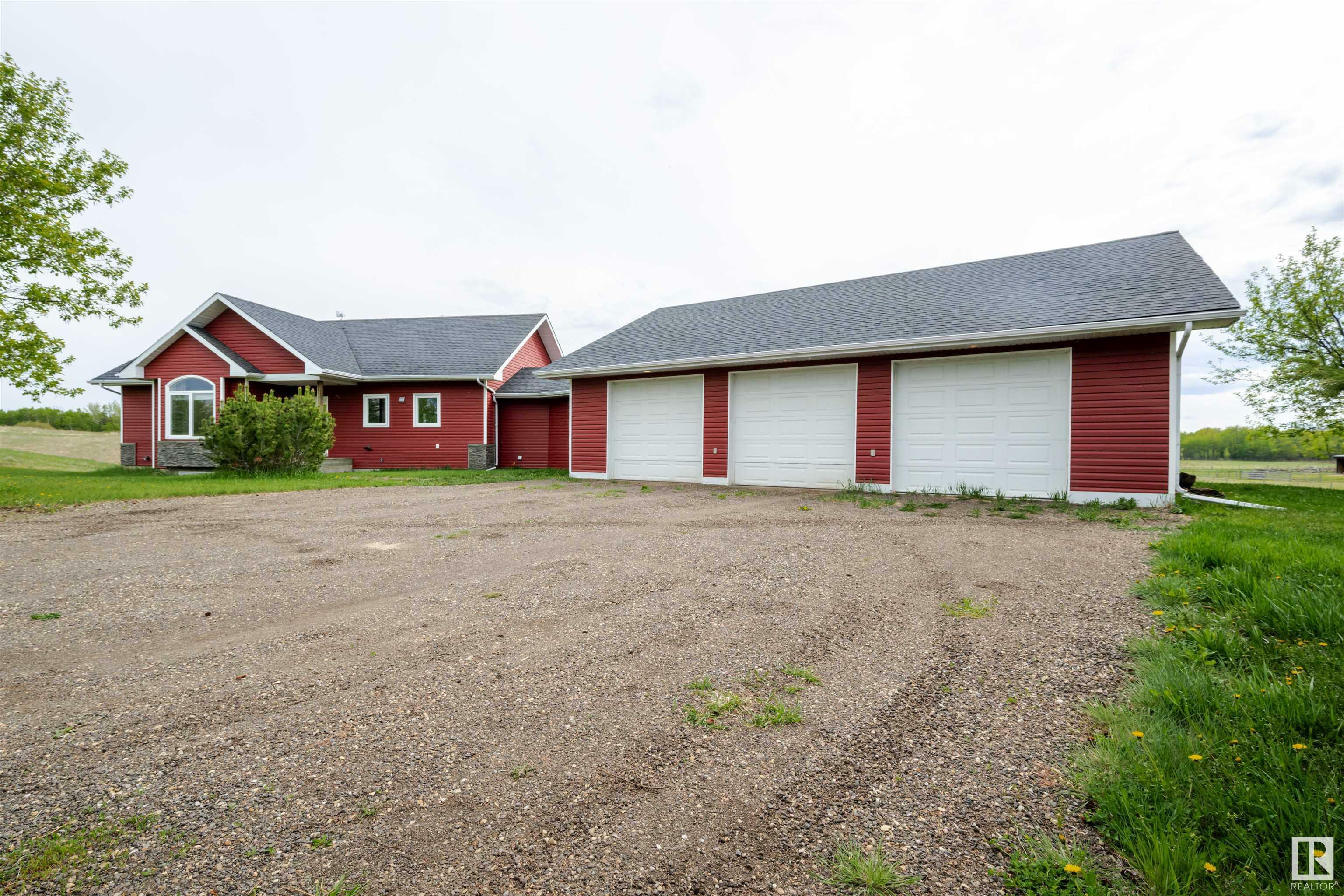 Property Photo: 50322 Rge Road 232 130 AB T4X 0K9