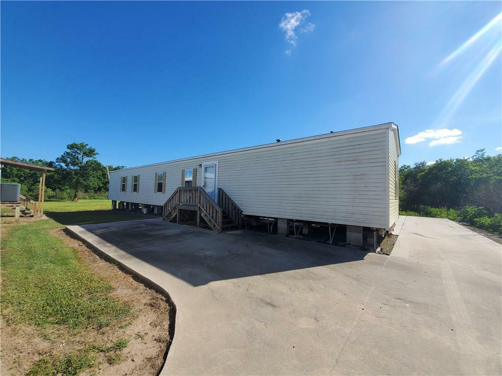 Property Photo: 30142 & 30144 Highway 23 LA 70083