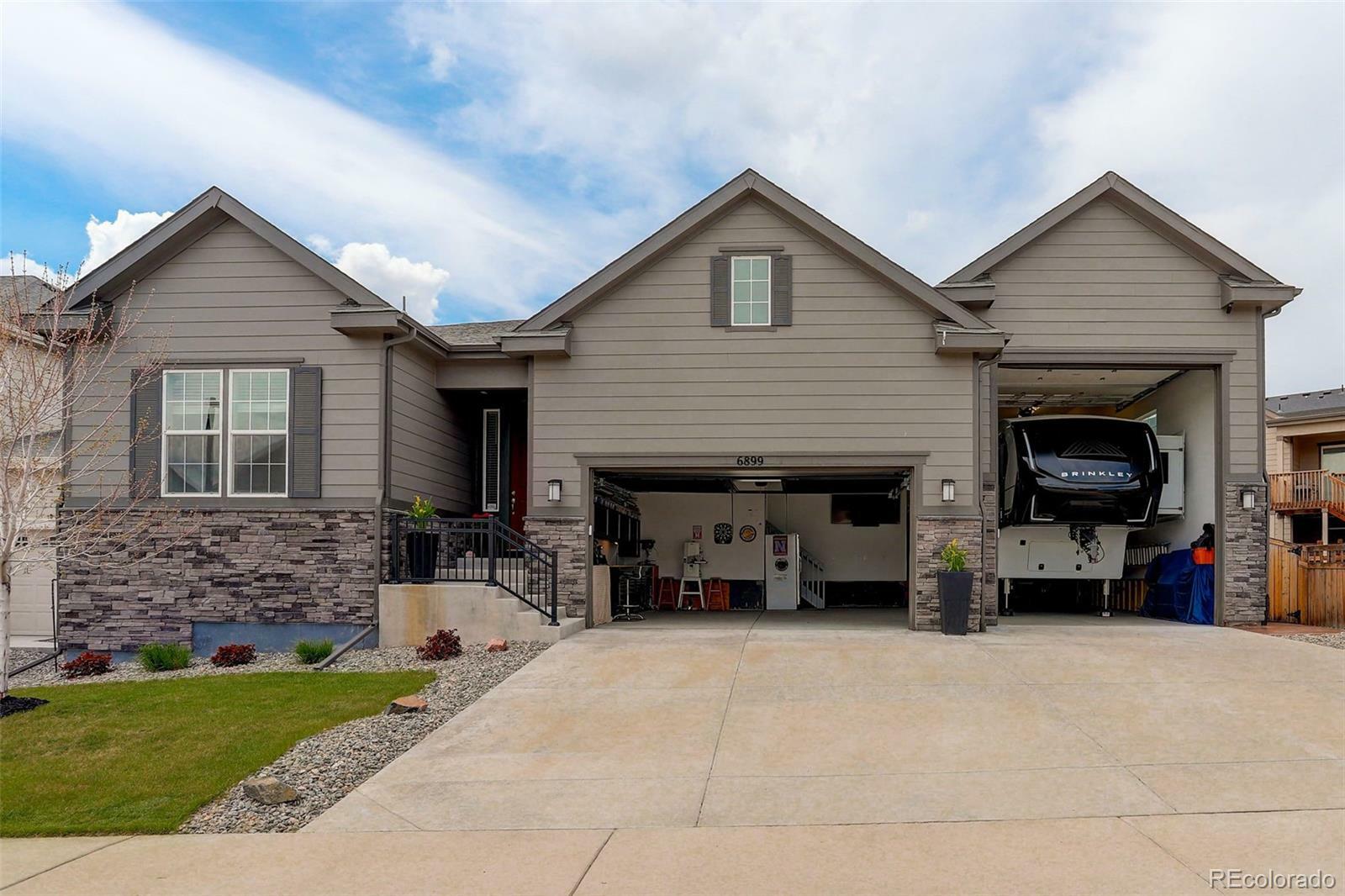 Property Photo: 6899 Petunia Place CO 80108