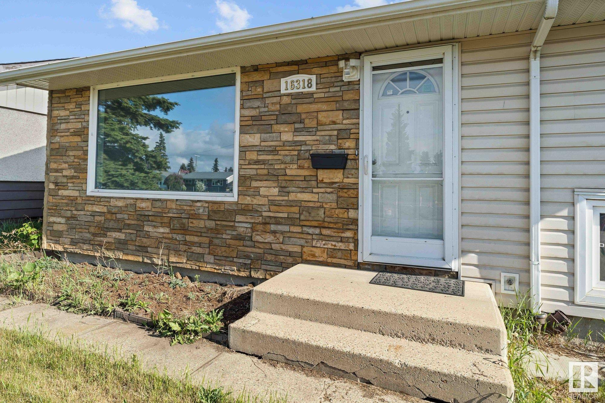 Property Photo: 16318 87 Avenue NW AB T5R 4H2