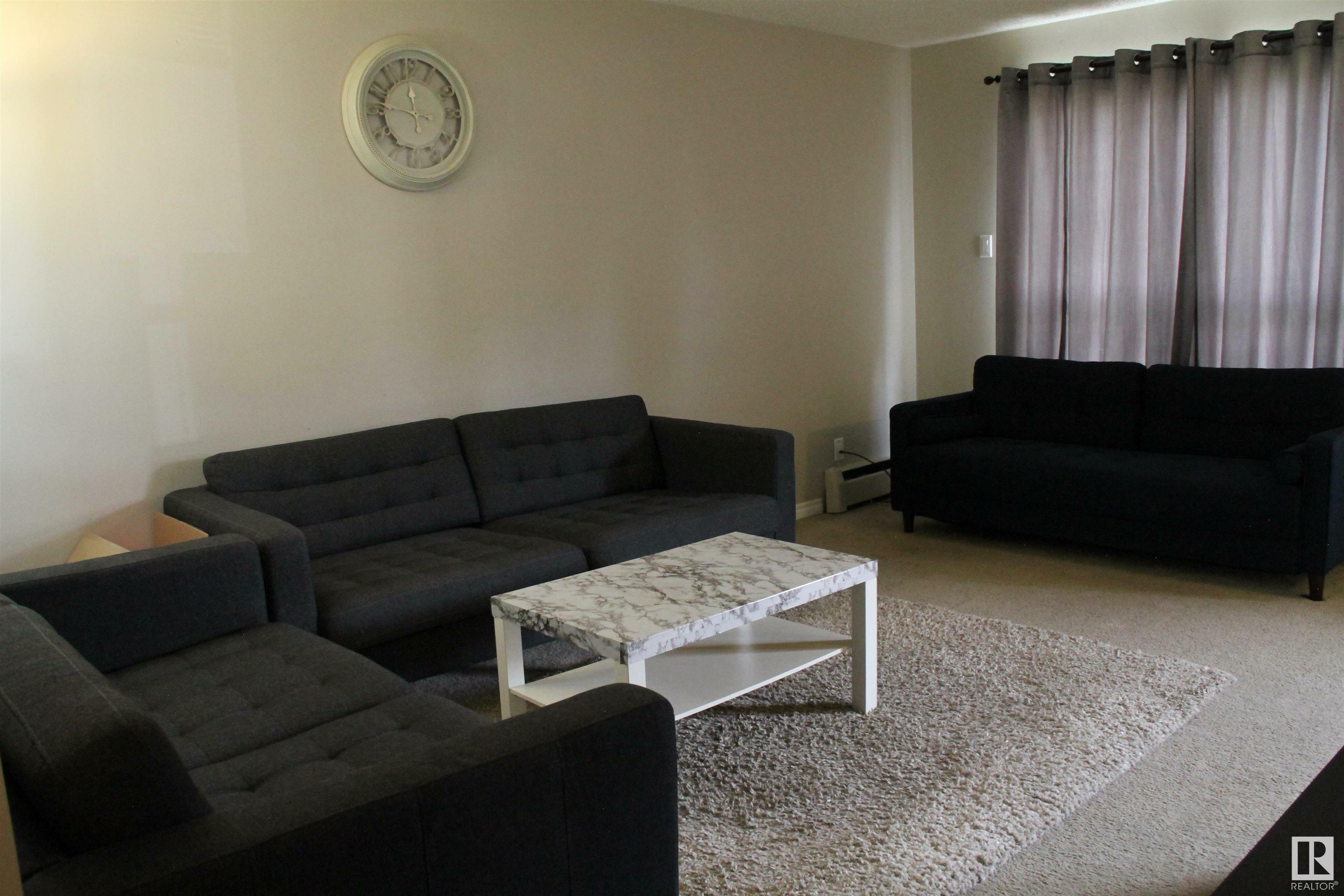 Property Photo: 237 Woodvale Rd NW 105 AB T6L 1E5