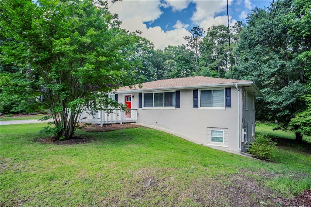 Property Photo:  3920 Stonewall Tell Road  GA 30349 