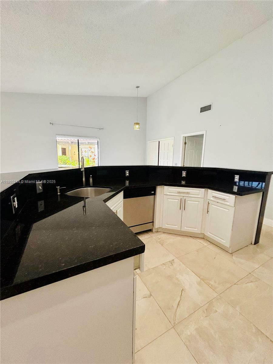 Property Photo:  3480 Torremolinos Ave A-33  FL 33178 