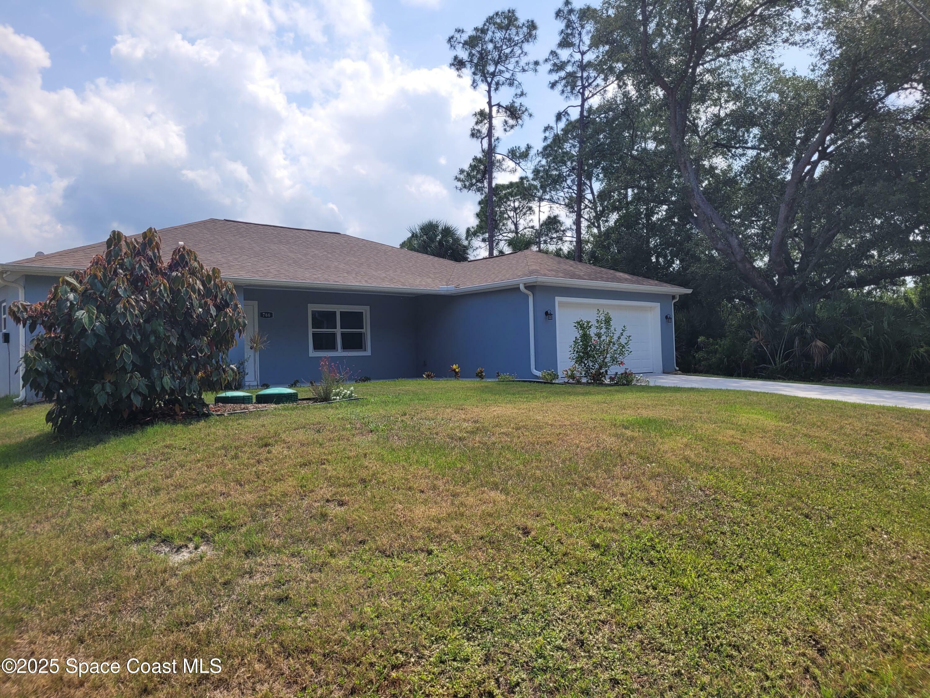 Property Photo: 766 Tooley Road SW FL 32908