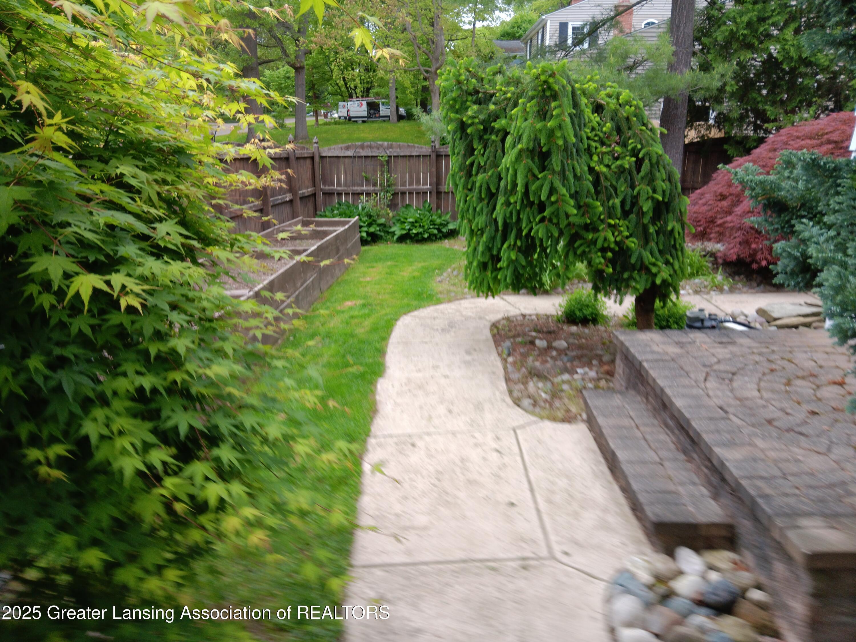 Property Photo:  1504 Forest Hills Drive  MI 48864 